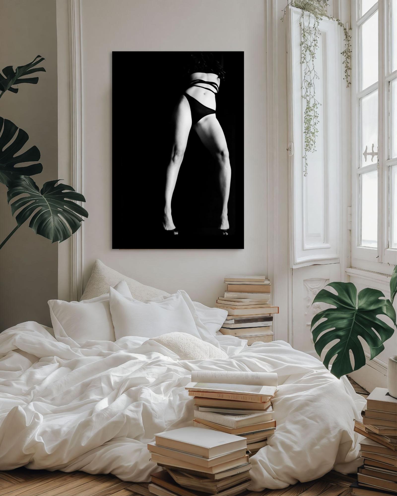 Stunning high-quality black and white wall-art on a white wall in bedroom.