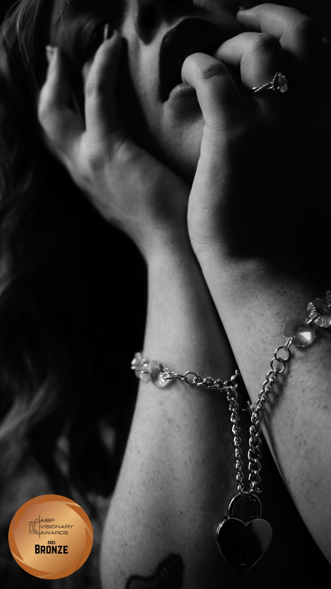 AIBP Bronze Award winning boudoir detail portrait, hands and chain jewelry, West Michigan photographer Betsy McCue